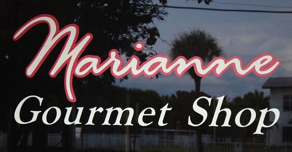 The Marianne Gourmet Shop window sign